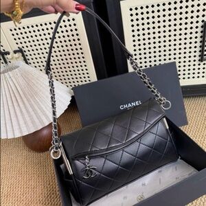 Elegant Black Quilted Shoulder Bag with Silver hardware